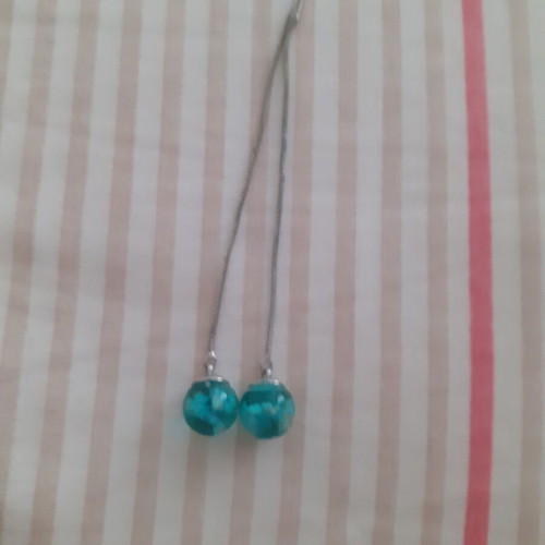 Dangling earrings new with blue sky design made of resin