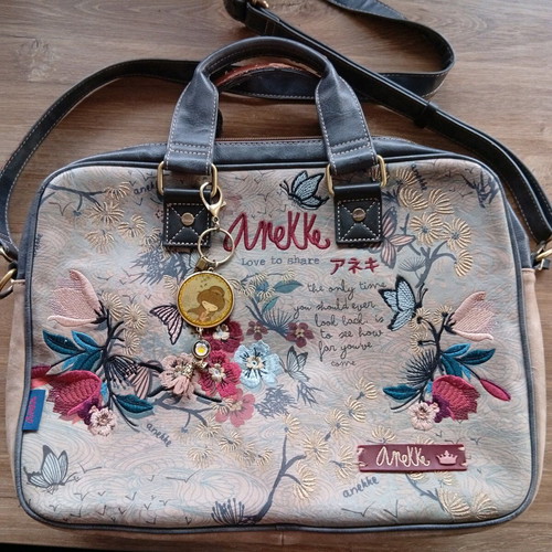 Anekke crossbody bag used with embroidery and keychain