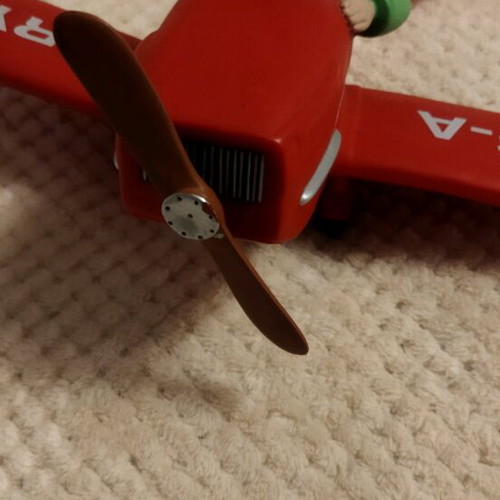 Le Petit Prince figure decorative like new with red airplane