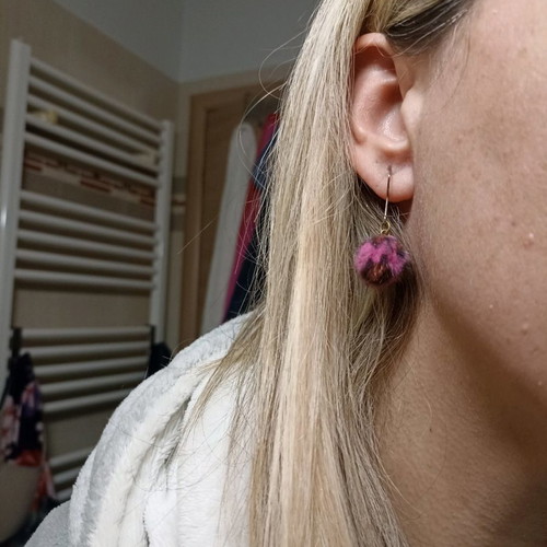 Pon pon animal print fuchsia earrings used