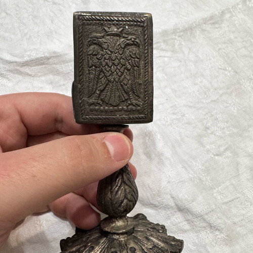 Base for objects used, bronze, several years old