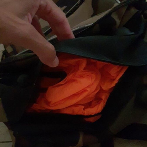 Polo school bag like new with orange rain hood
