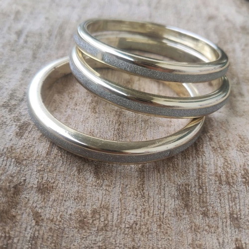 Bracelet set used, 3 round gold plastic with silver glitter