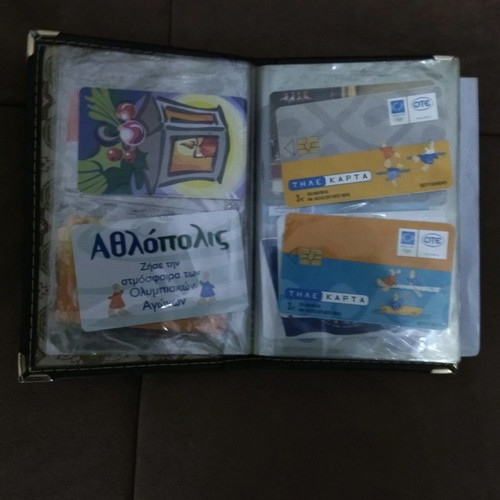 Collectible old phone cards with album used