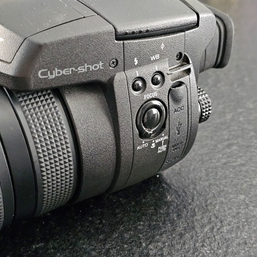 Sony Cyber-shot DSC-R1 camera with Carl Zeiss T* lens