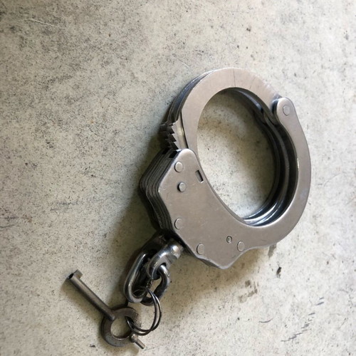 Old gendarmerie handcuffs used with original key