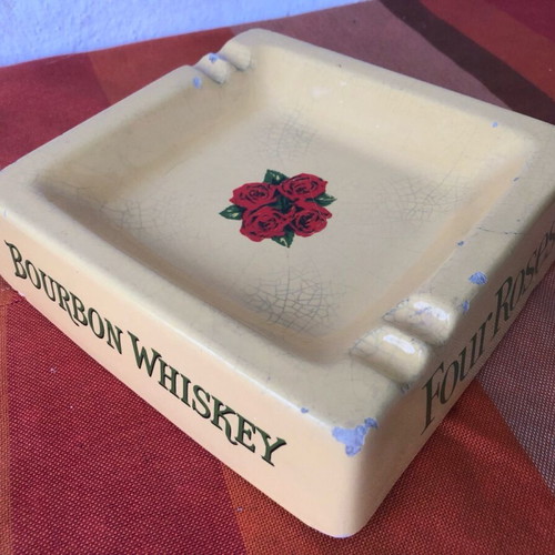Four Roses porcelain ashtray used with cracks and chips