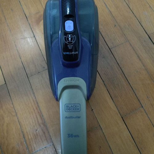 Black and Decker stick vacuum used, defective battery, with charger and brush