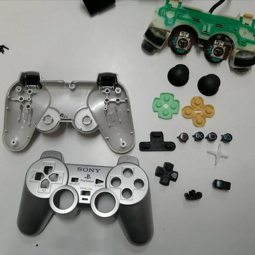 Playstation 2 Fat Silver SCPH-50004 σαν καινούργιο με 2 χειριστήρια και 2 παιχνίδια