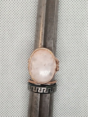 Steel rings size 9.5 like new with rose quartz and meander design
