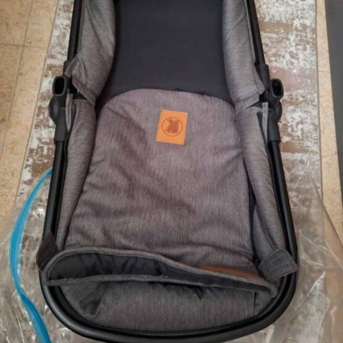 Kiddo 3-in-1 stroller used with carrycot, bassinet, and seat