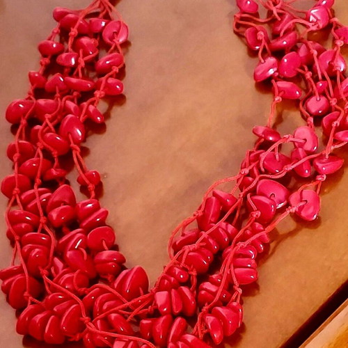 Red multi-strand stone necklace