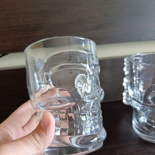 Skull-shaped glasses like new, set of two