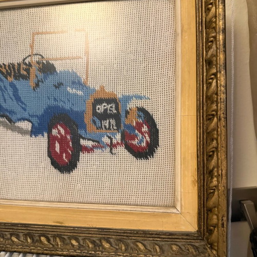 Vintage wooden frames used with hand-stitched car designs