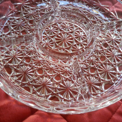 Crystal round serving platter with five sections and intricate embossed design, new