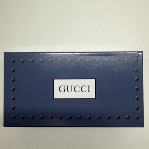 Gucci GG1604S 001 sunglasses, gold frame with black lenses