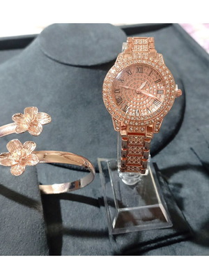 Jewelry set with rose gold watch and bracelet
