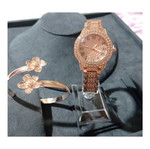 Jewelry set with rose gold watch and bracelet