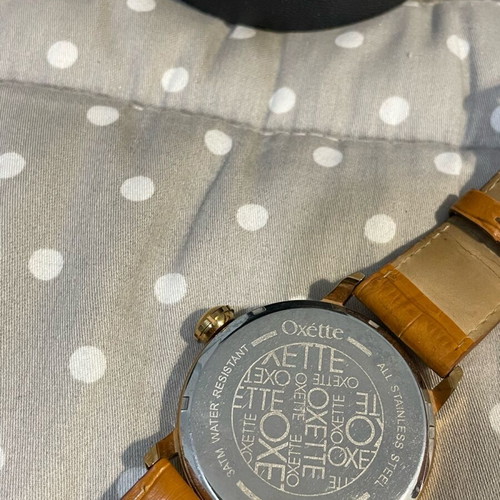 Oxette wristwatch used, brown and gold