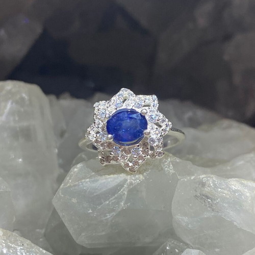 Handmade silver ring with natural blue sapphire and moissanites