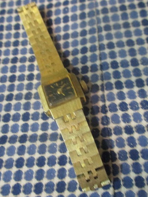 Orient women's manual wristwatch used, green and gold