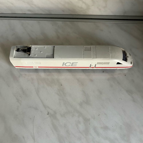 Marklin digital ICE HO train engine and one car used, for repair or parts
