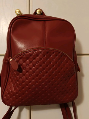 Red backpack like new made of leatherette