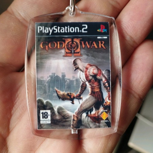 God of War 2 PS2 keychain new, acrylic