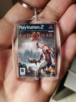 God of War 2 PS2 keychain new, acrylic
