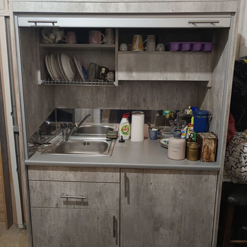 Kitchen cabinet used with drawers, cupboards, dish rack, sink, faucet, water heater