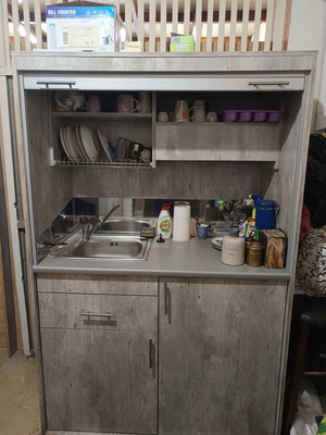 Kitchen cabinet used with drawers, cupboards, dish rack, sink, faucet, water heater