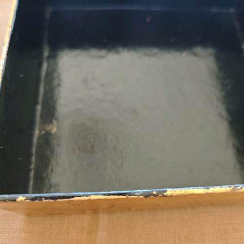 Decorative gold box like new with balls and ribbons