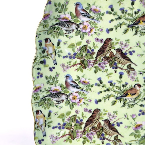 Porcelain serving platter decorated with birds and flowers like new