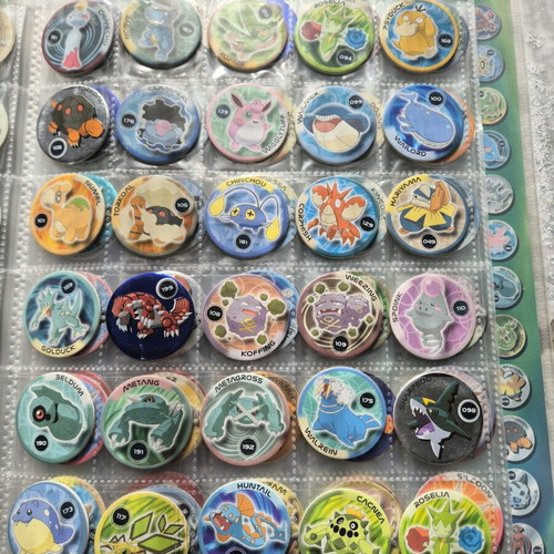Pokemon collectible caps 213 pieces like new