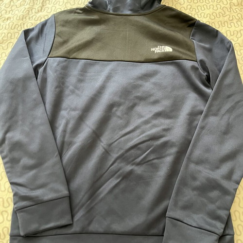 The North Face jacket brand new, 18-20 years old, black and blue