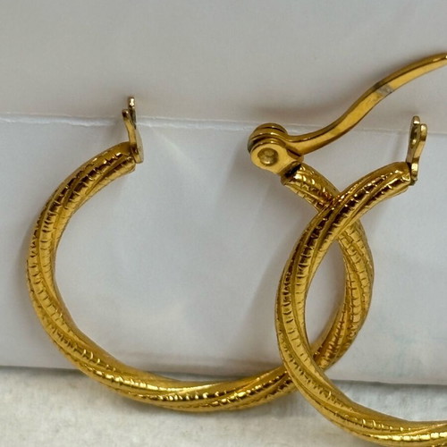 Iron golden rings with a twisted design.