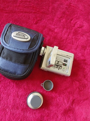 Retro camera used with case and memory card