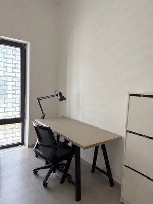 Modern office desk with large workspace