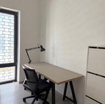 Modern office desk with large workspace