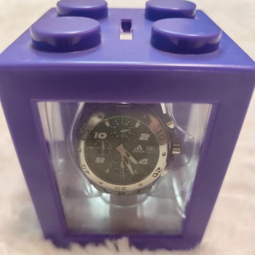 Adidas wristwatch used, silver color