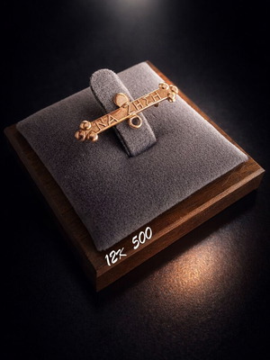 Gold baby pin 12K 0.50g like new, newborn amulet