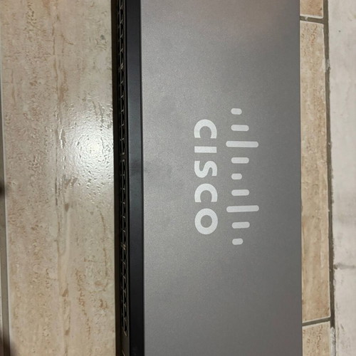 Cisco SF220 48port switch used with 2 gigabit ports and 2 SFP slots