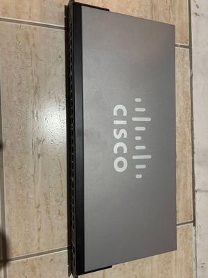 Cisco SF220 48port switch used with 2 gigabit ports and 2 SFP slots