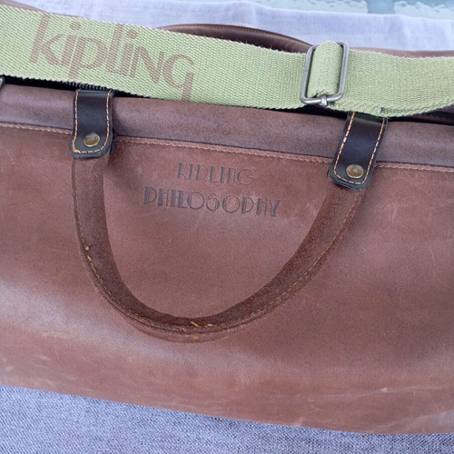 Kipling leather travel bag camel color like new