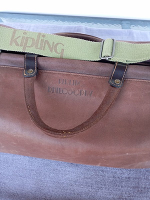 Kipling leather travel bag camel color like new