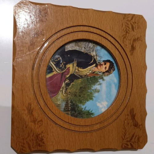 Framed art with Cretan girl theme very old with postcard
