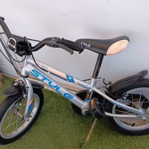 Boy's city bike silver with blue and orange designs like new with training wheels