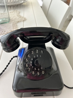 Bakelite telephone like new, black wired