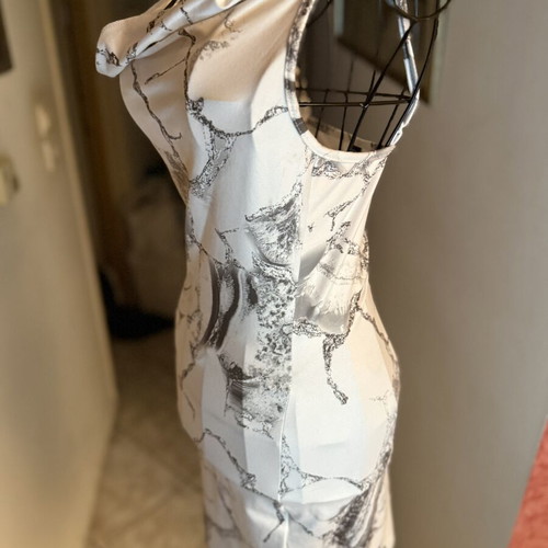 Mini dress with marble print like new, fitted with draped neckline