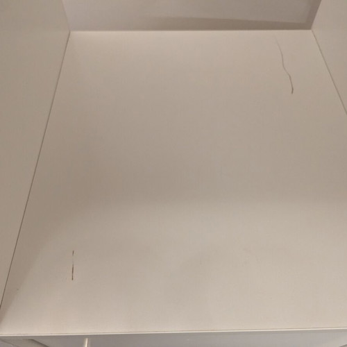 IKEA Kallax white shelving unit with 4 inserts